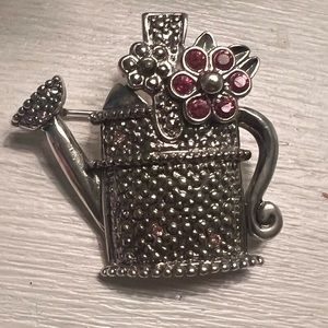 Vintage stamped water can brooch